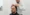 Technician fitting a hairpiece on a bald man's head – Custom Hairpieces in Birmingham.